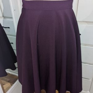 Large purple mid length high waisted swing skirt